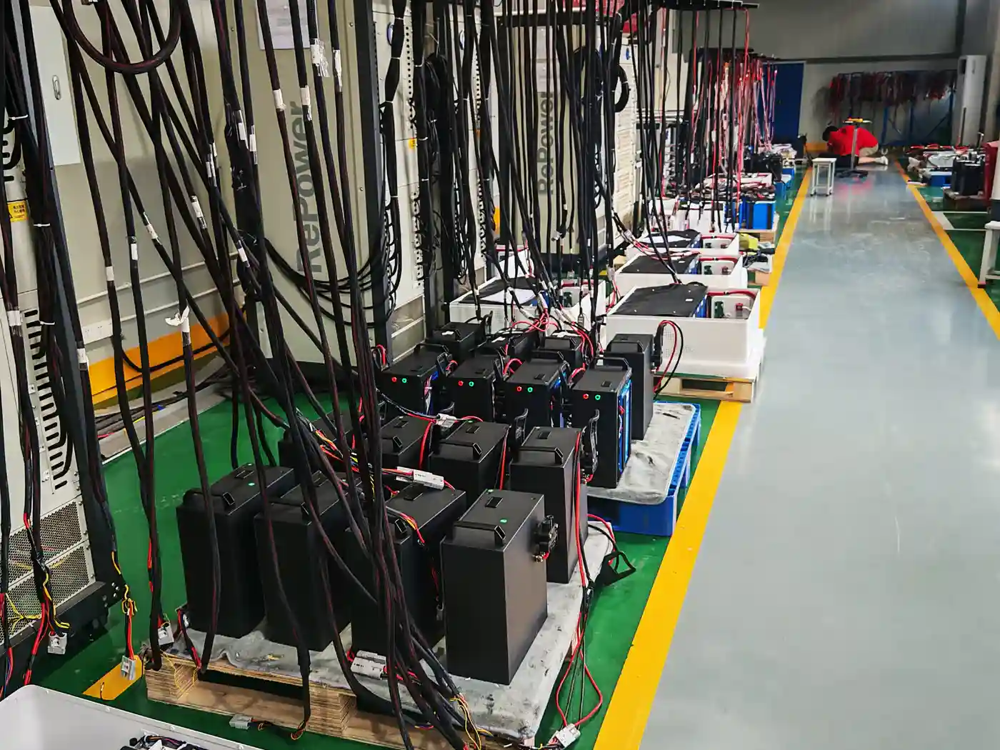 Battery packs connected in the factory charge-discharge testing area